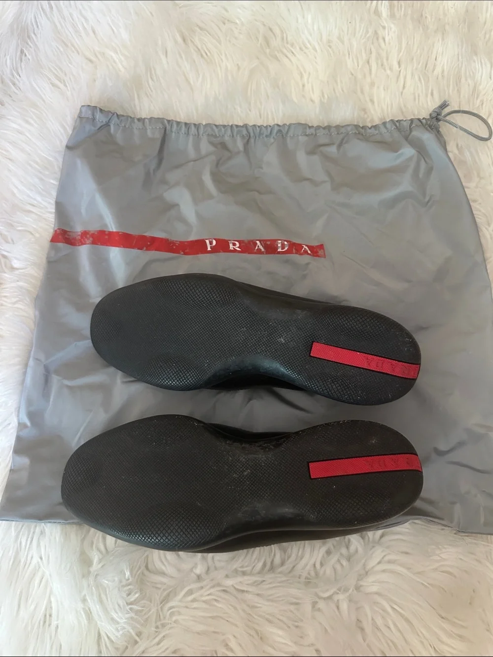 Prada Black Leather Slip-On Loafers with Triangular Logo